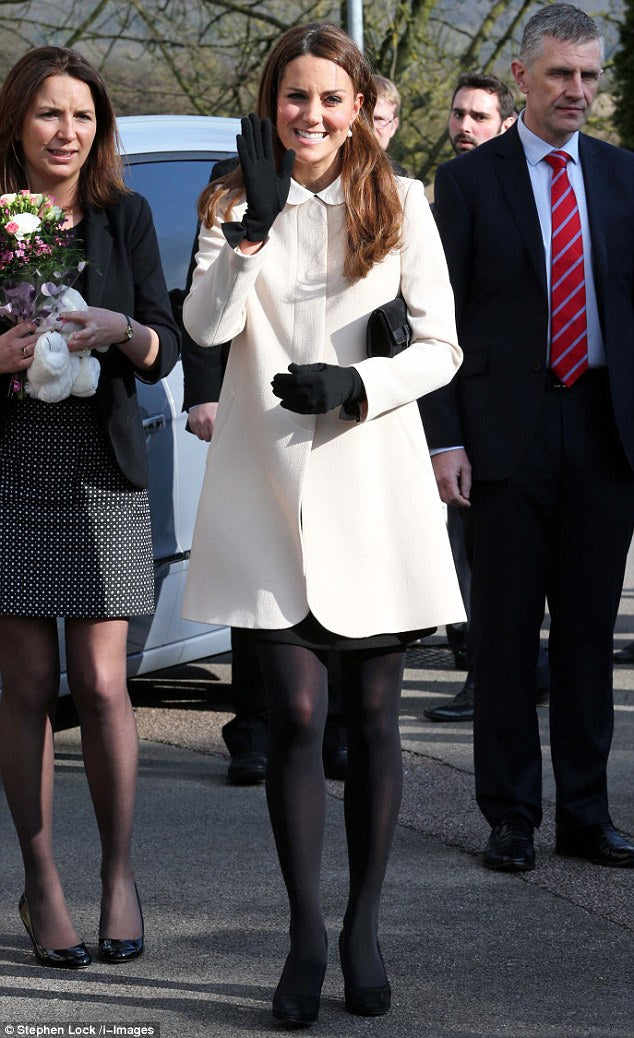 The Duchess of Cambridge shines in white for a visit with Prince William-Cornelia James